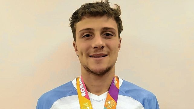 Franco Rossetto, con la medalla en rugby.