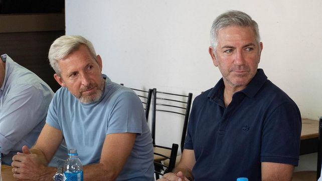 Rogelio Frigerio junto a Juan Ruiz Orrico.