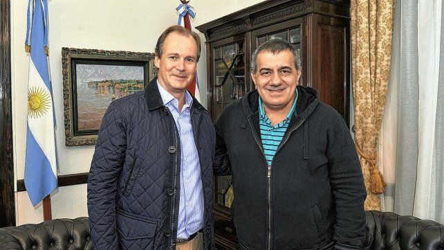 José Cáceres junto a Gustavo Bordet.